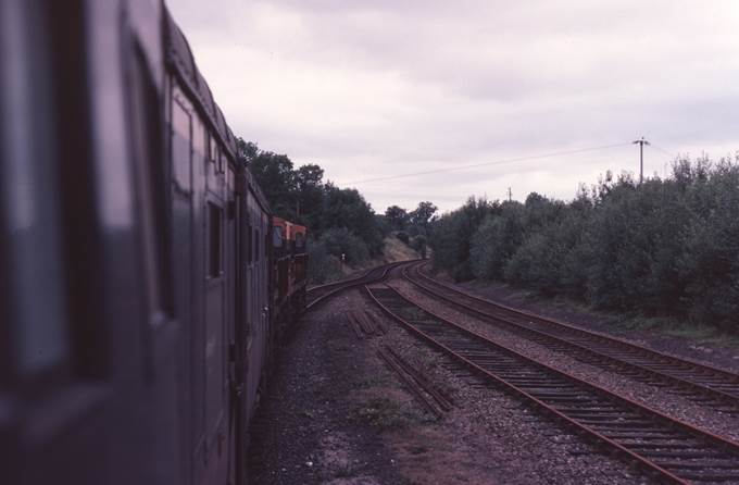 A train on the railway tracks
Description automatically generated with medium confidence