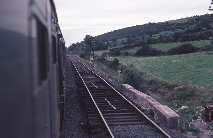 A train on the railway tracks
Description automatically generated with medium confidence